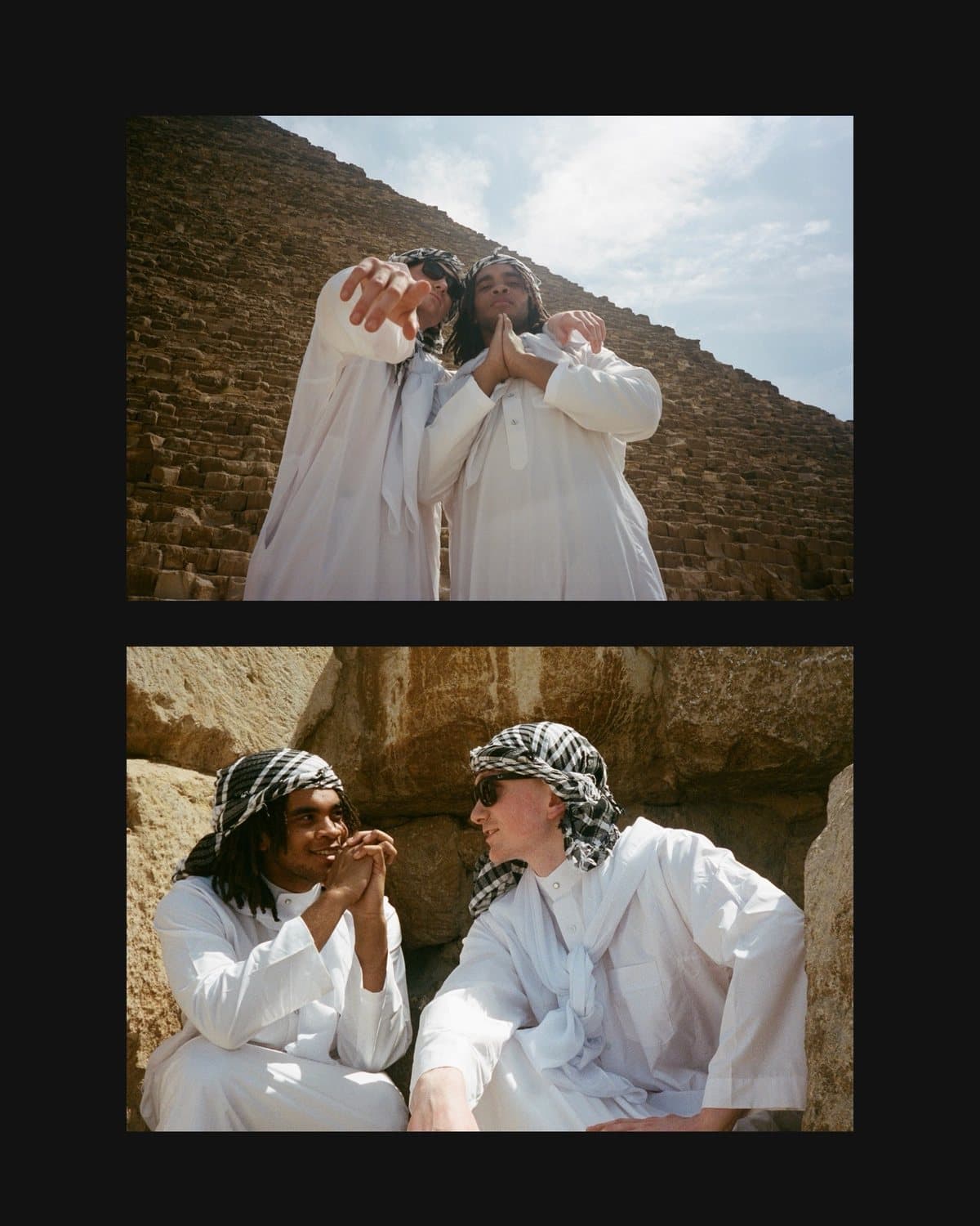 Two figures in white in the desert outside Cairo