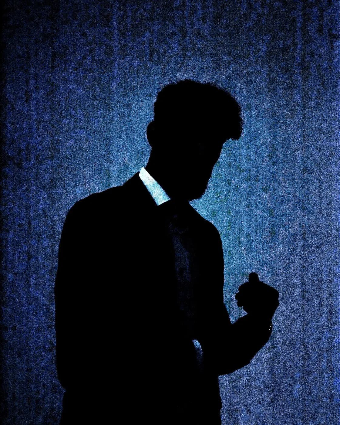 A silhouette against blue
